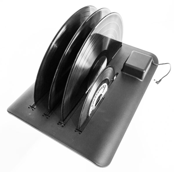 Black vinyl record holder with three records on a white background
